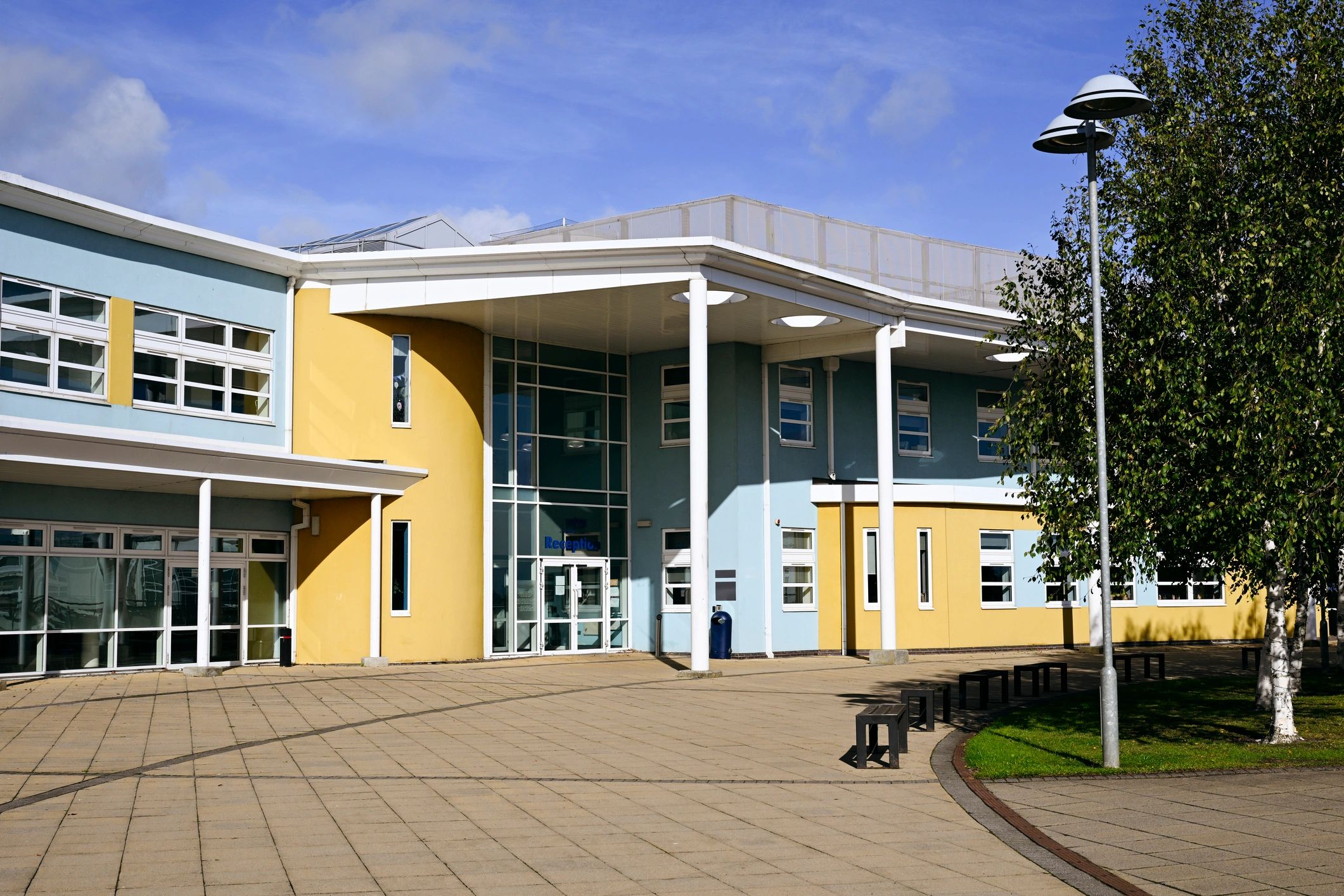 Commercial glass exterior representing business service expertise